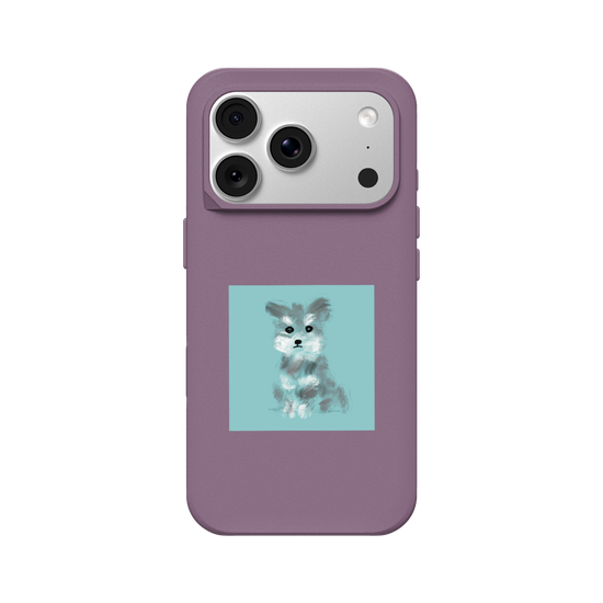 A Schnauzer sitting down