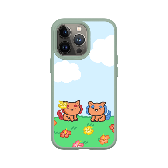 lion dogs in a hibiscus field